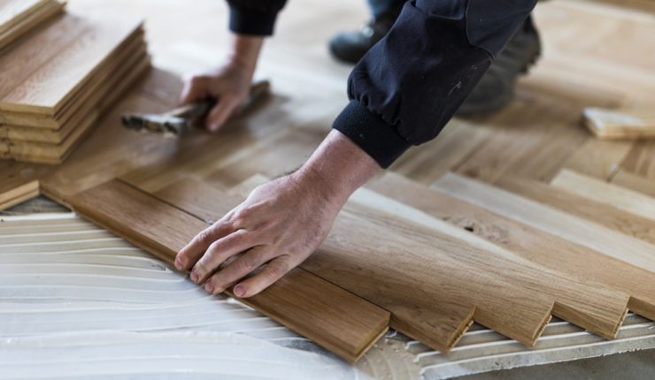 man fitting floor